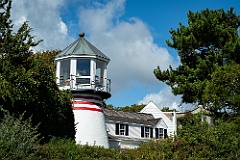 South Hyannis Harbor Light on a Sunny Day with Billowing Clouds